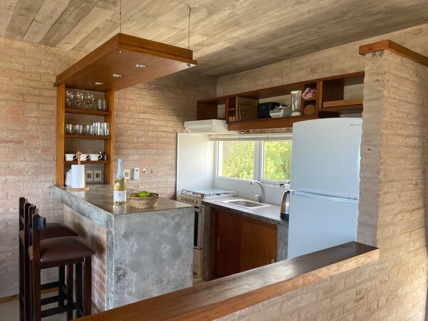 Cocina integrada con barra